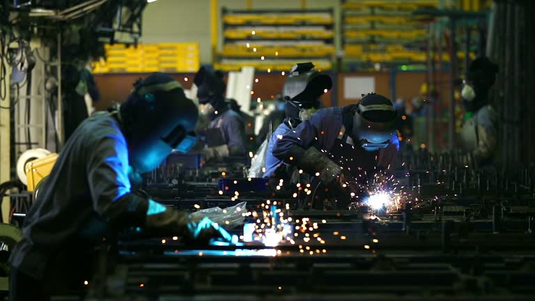 Welding work at industrial factory.